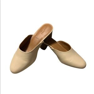Cream colored closed toed mules